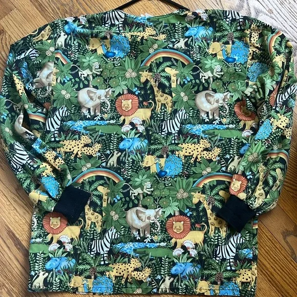 Jungle print scrub jacket. Snap closure. Knit cuffs. 2 pockets Small - Picture 3 of 3
